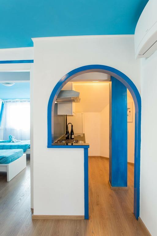 Appartamento Santorini ลิโด ดิ ออสเตีย ภายนอก รูปภาพ